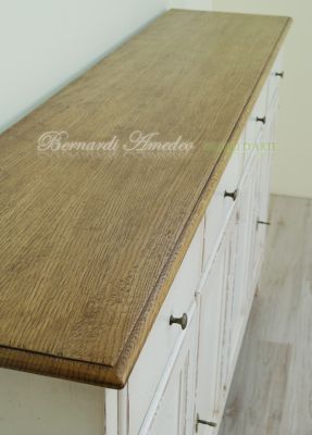 Kitchen or living room cupboard in solid wood with very antique white finish and solid oak top